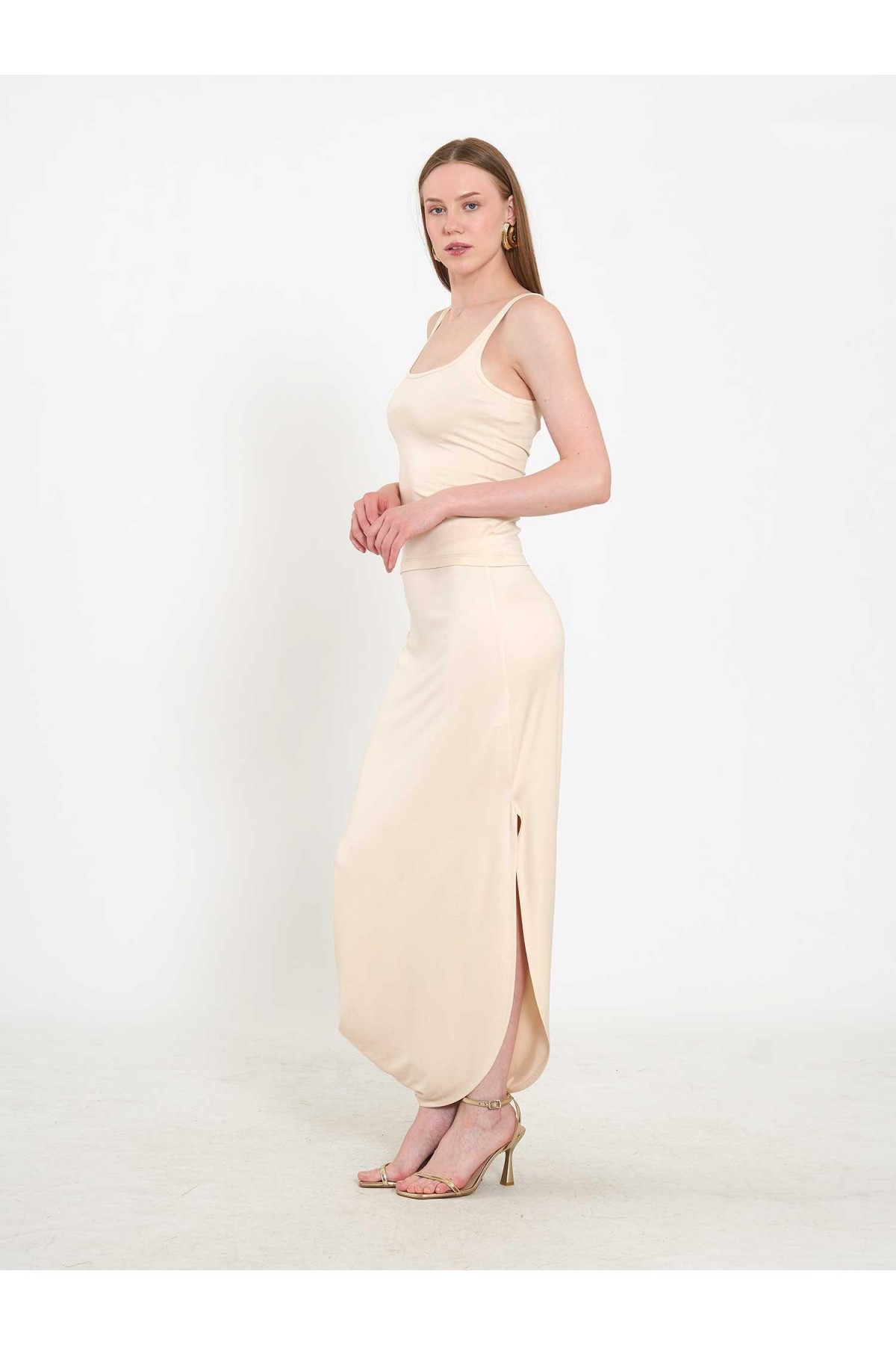 041197 Elastik Belli Asimetrik Midi Etek