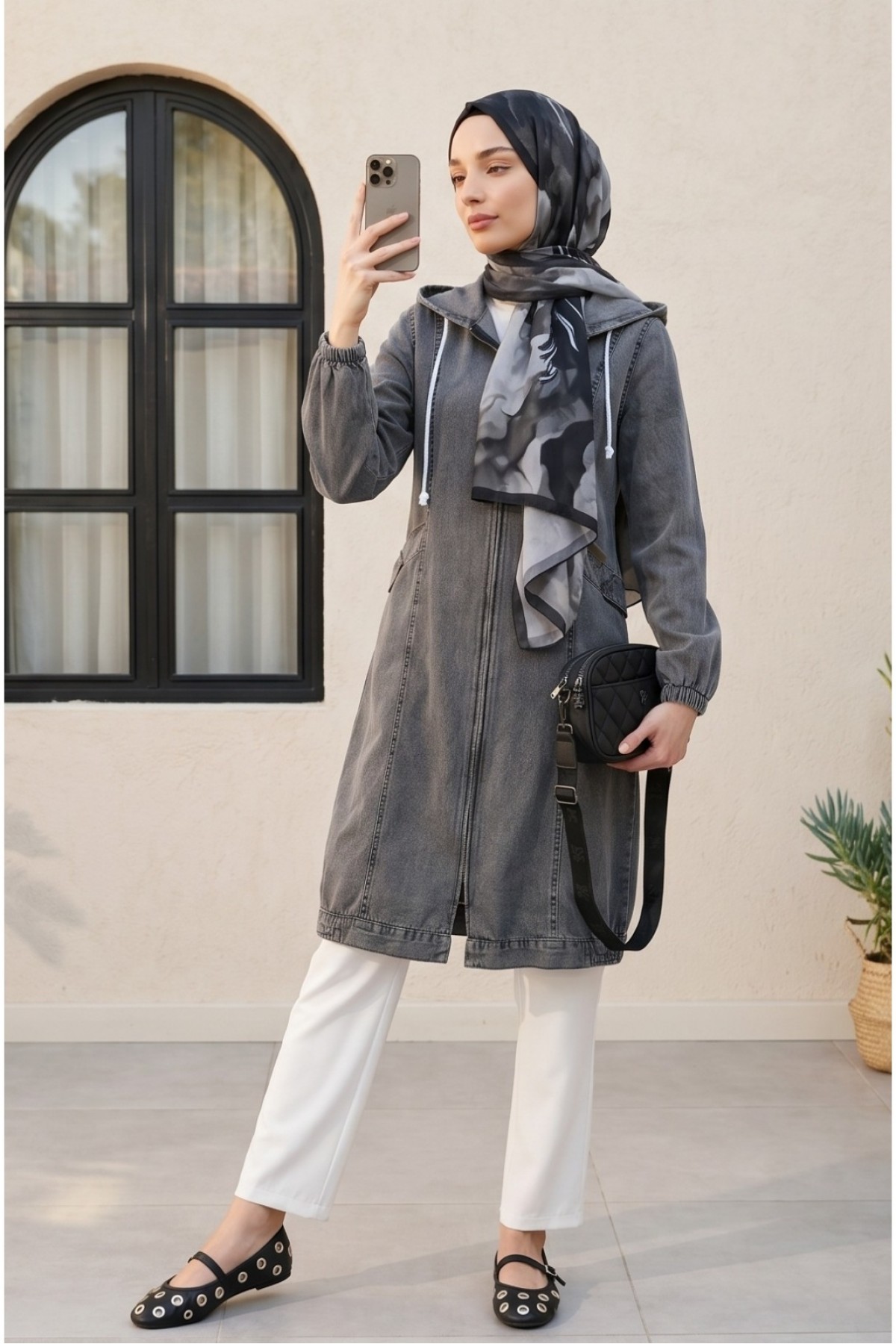 Hooded denim jacket with pockets, elasticated cuffs, and front zip closure.  -Smoked 