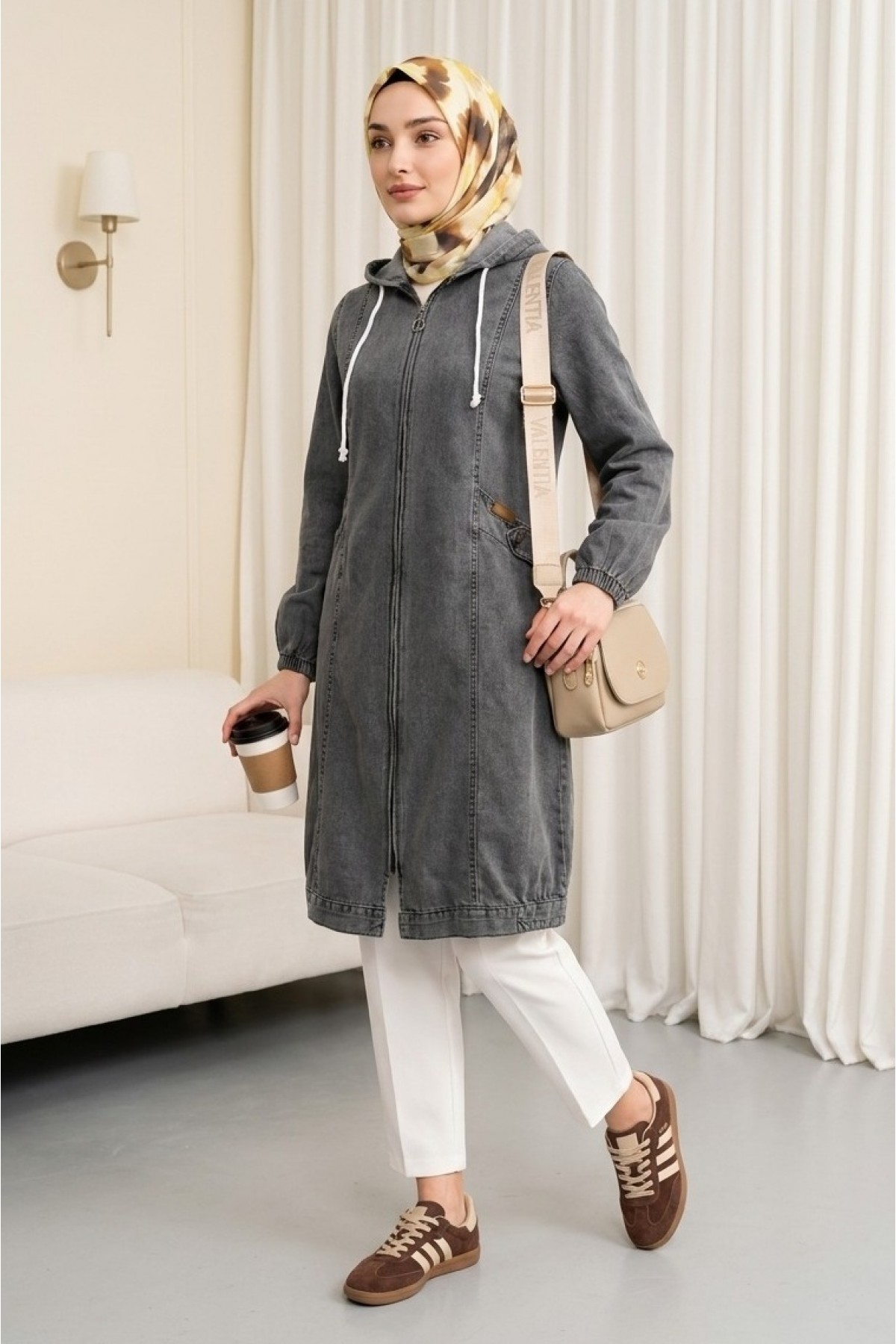 Hooded denim jacket with pockets, elasticated cuffs, and front zip closure.  -Smoked 