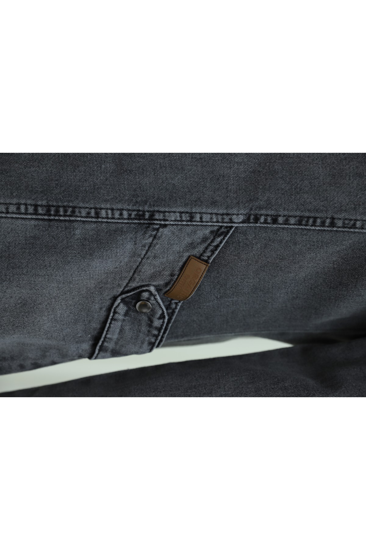 Hooded denim jacket with pockets, elasticated cuffs, and front zip closure.  -Smoked 