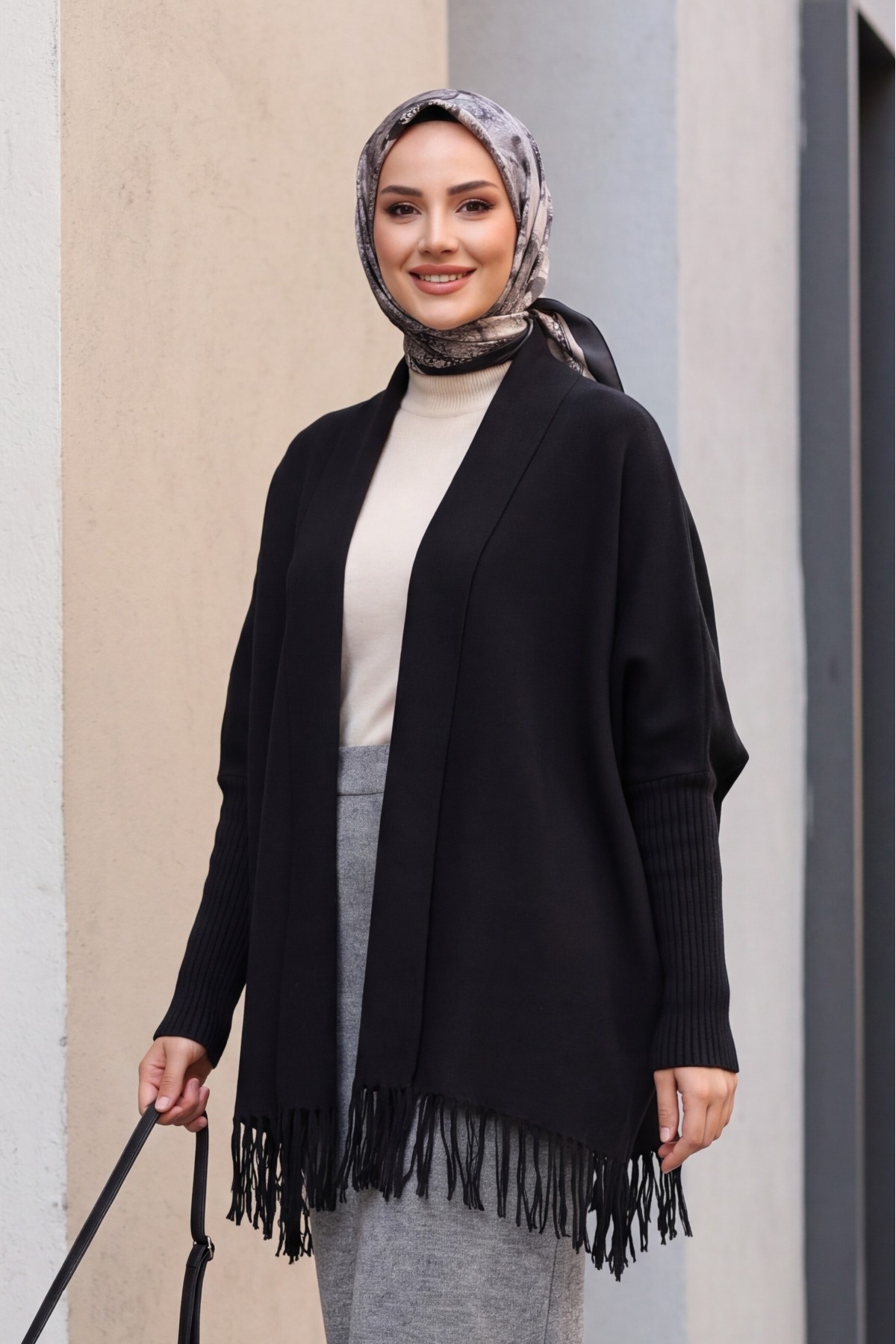 Knit Poncho with Tassel-Trimmed Sleeve Cuffs -Black