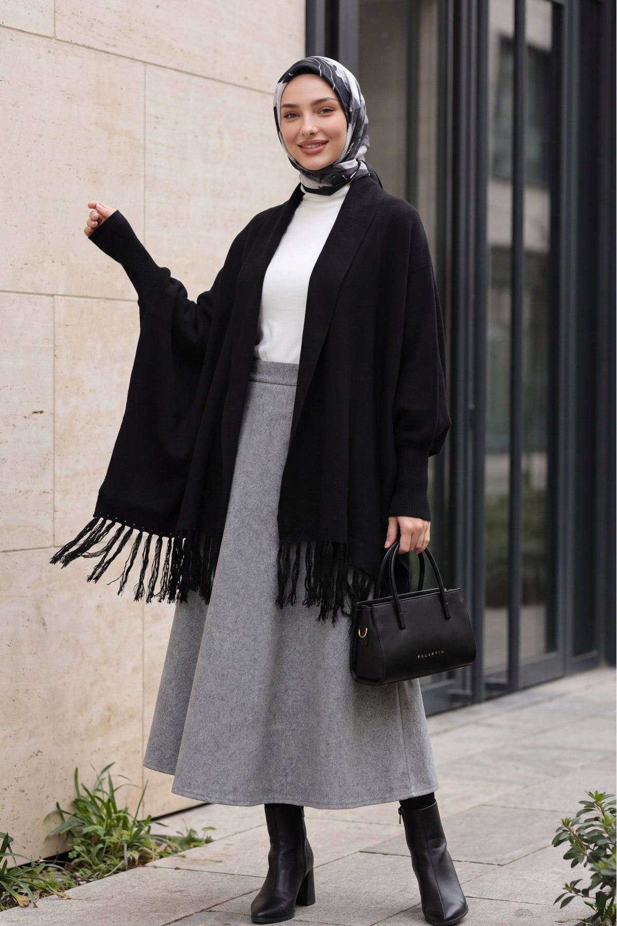 Knit Poncho with Tassel-Trimmed Sleeve Cuffs -Black