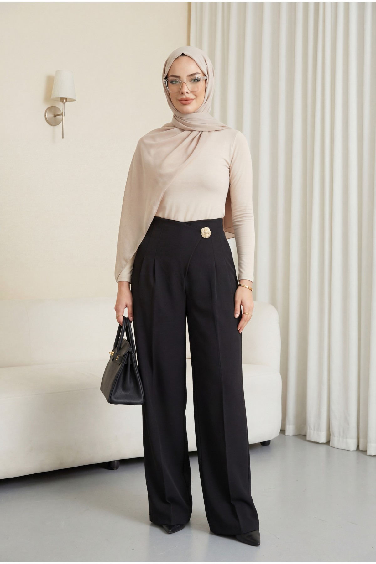 Wide-leg crepe trousers with side zipper, brooch, and folding detail. -Black