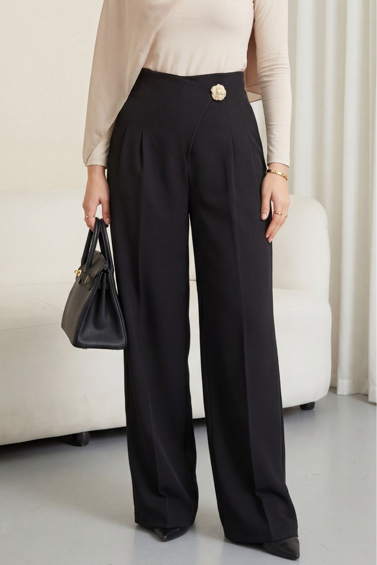 Wide-leg crepe trousers with side zipper, brooch, and folding detail. -Black