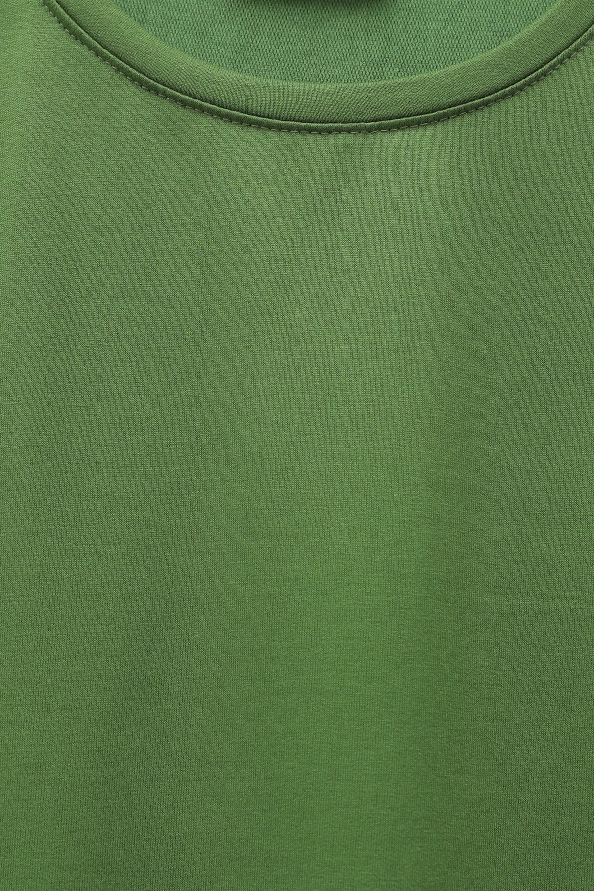 Loose-fitting cotton tunic with heart detail and slit at the hem. -Khaki