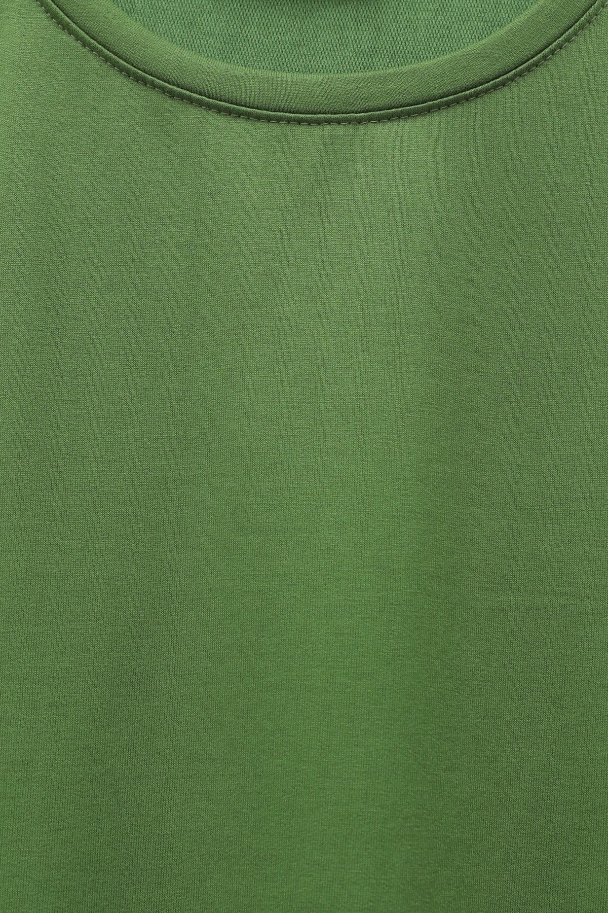 Loose-fitting cotton tunic with heart detail and slit at the hem. -Green