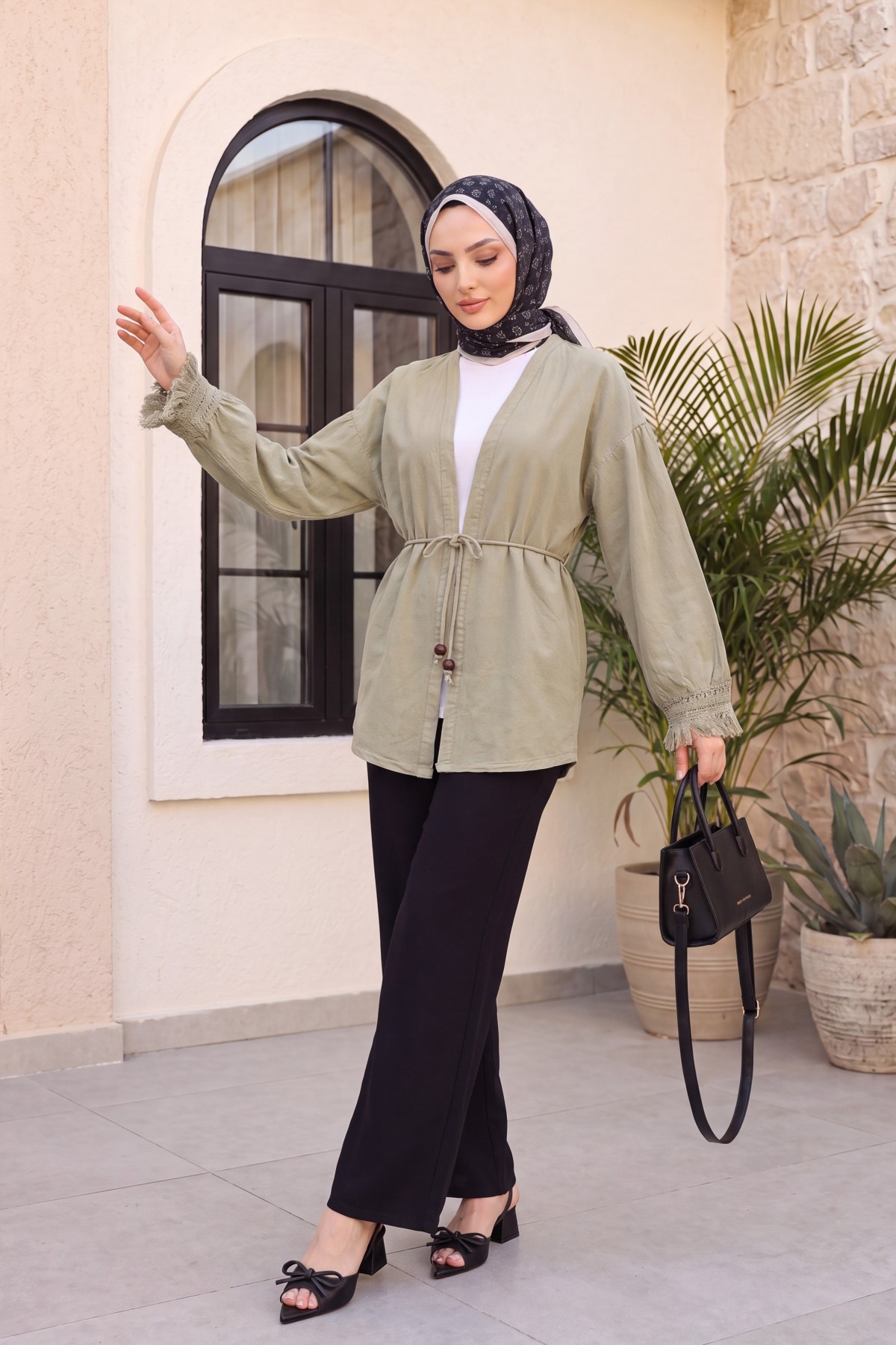 Linen-look kimono with lace tassel cuffs and drawstring waist. -Mink color