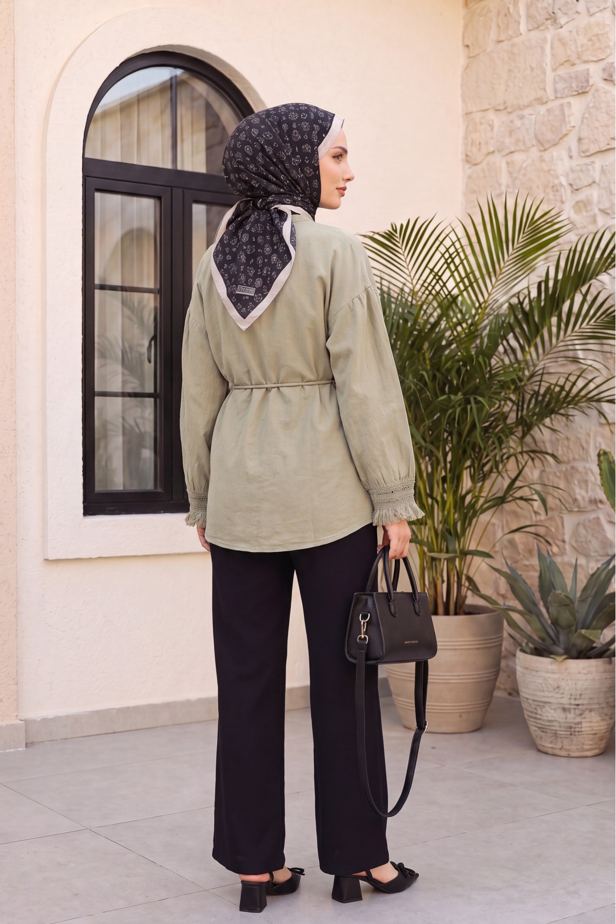 Linen-look kimono with lace tassel cuffs and drawstring waist. -Mink color