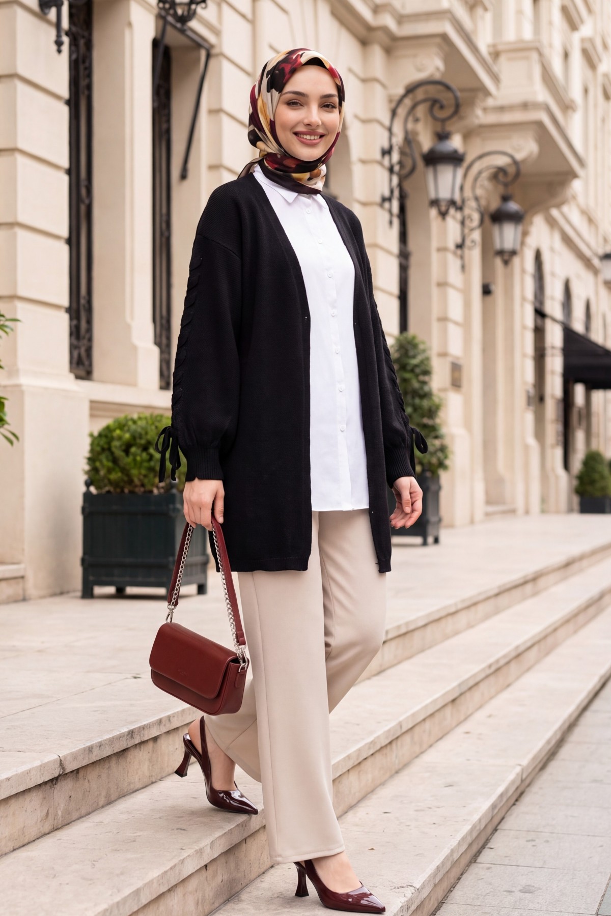Loose-fitting knitted cardigan with braided sleeves -Black