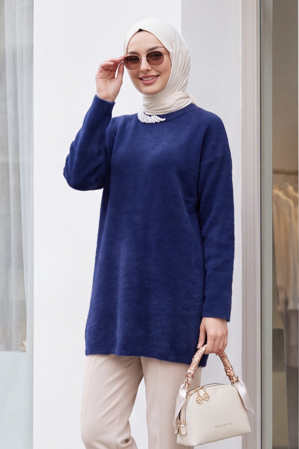 Fuzzy Knit Tunic with Pearl Detail on the Collar -Navy blue