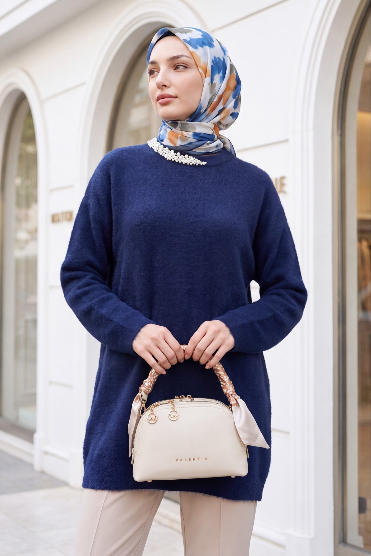 Fuzzy Knit Tunic with Pearl Detail on the Collar -Navy blue