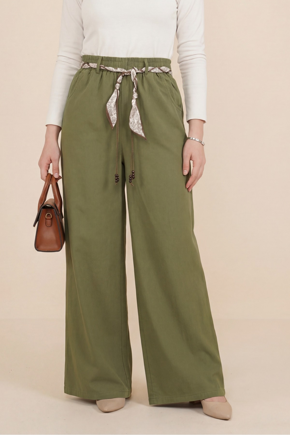 Wide-leg linen trousers with elasticated waist, belt, and pockets. -Khaki