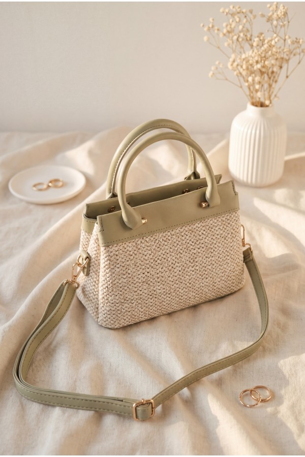 Long-strap, handle bag with knitted detail, zipper and snap closure. -Sea green