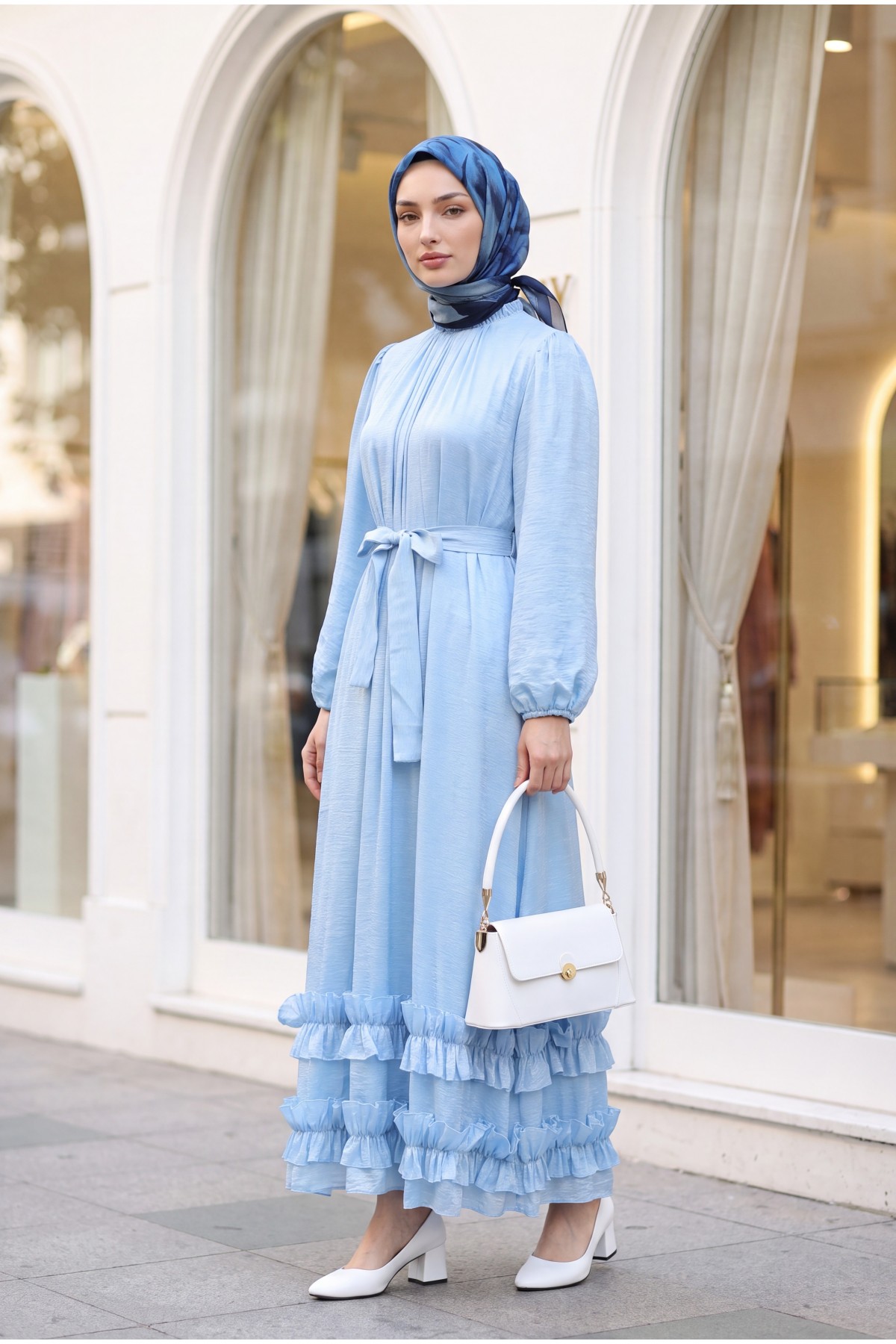 Long dress with ruffled neckline and hem, elasticated sleeves, crinkle crepe lining. -Baby Blue