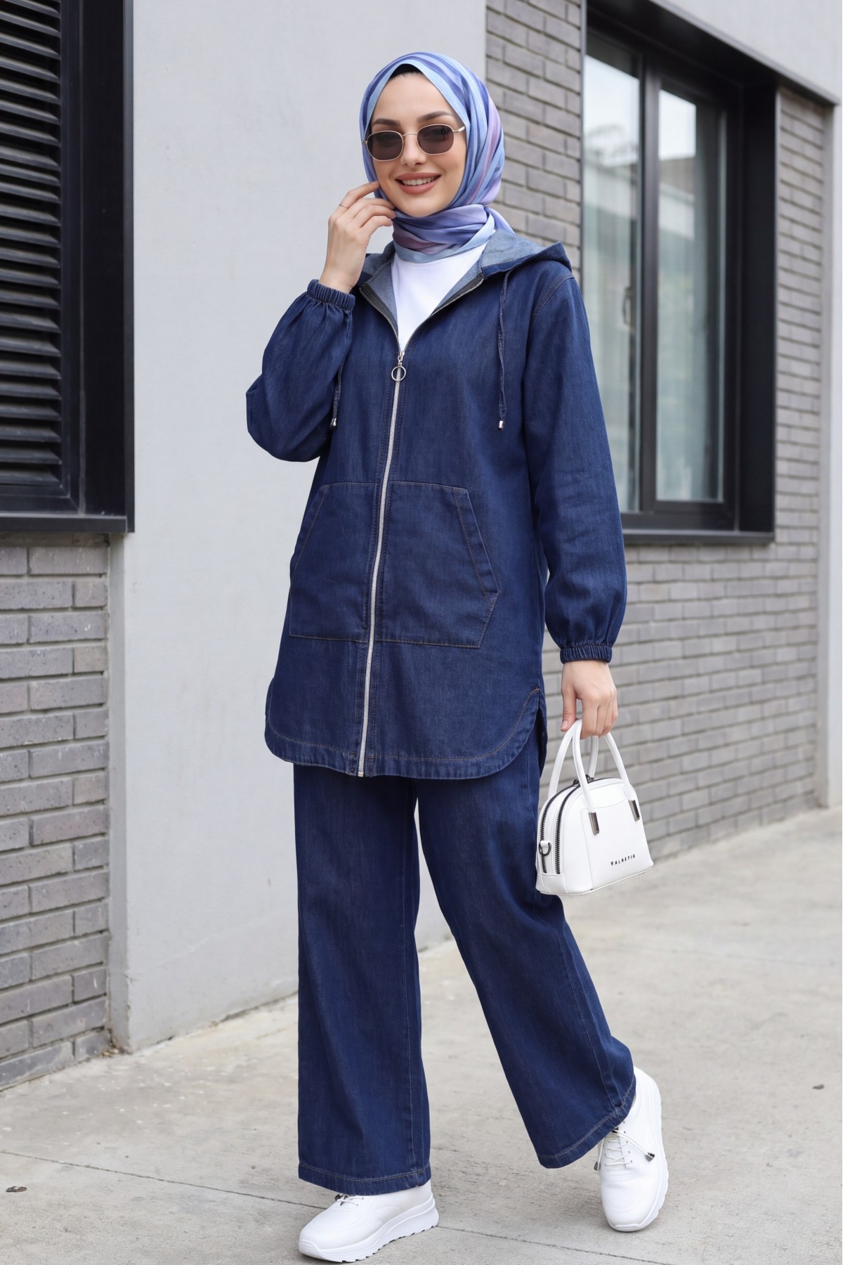 Hooded denim suit with front zip, elasticated cuffs, and pockets.   -Dark blue