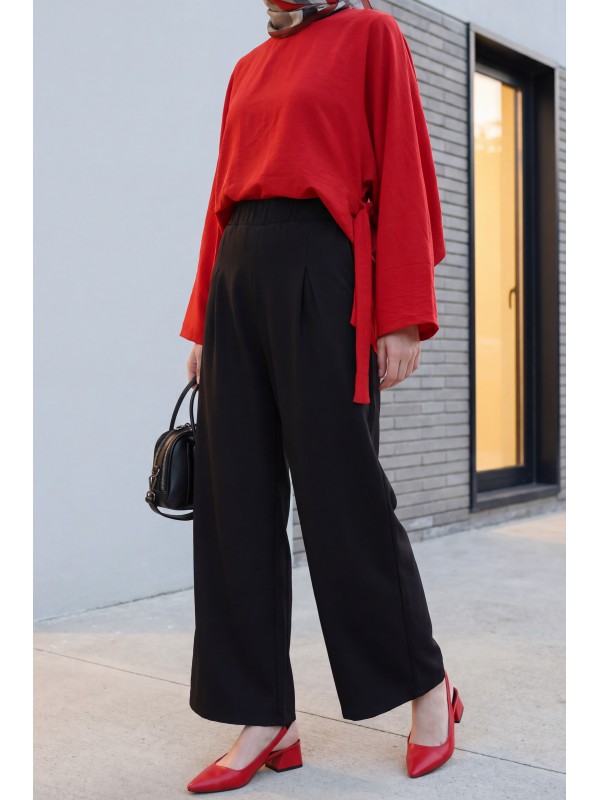 Wide-leg pleated linen-look trousers with elasticated waist. -Black