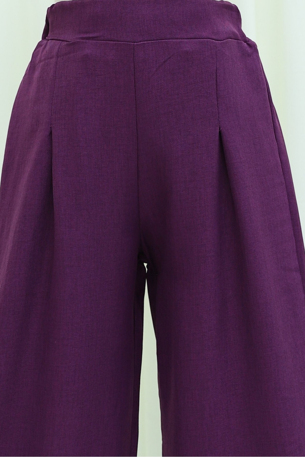 Wide-leg pleated linen-look trousers with elasticated waist. -Damson
