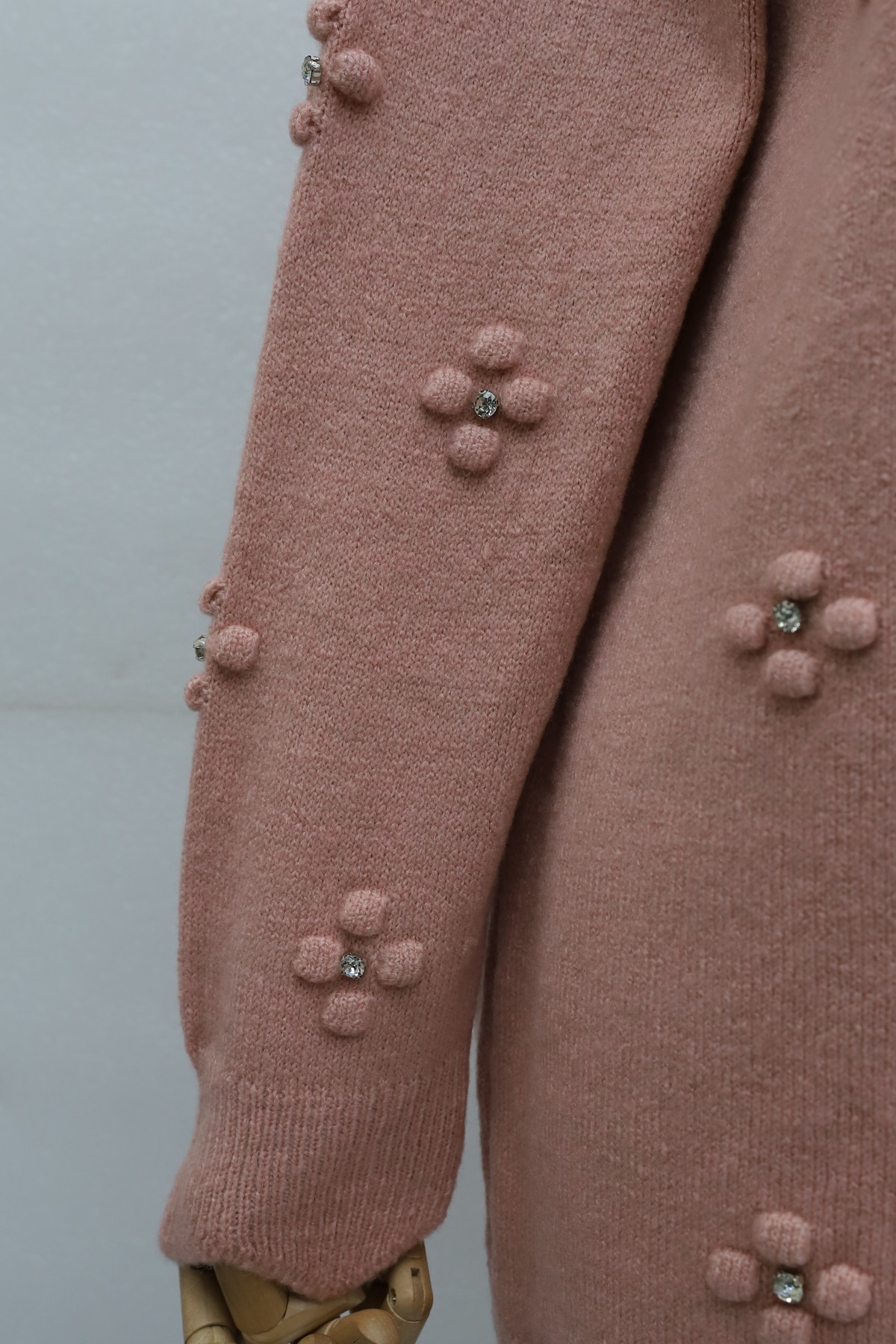 Asymmetric Knit Tunic with Rhinestone Pom-Pom Detail -Puppies mouth