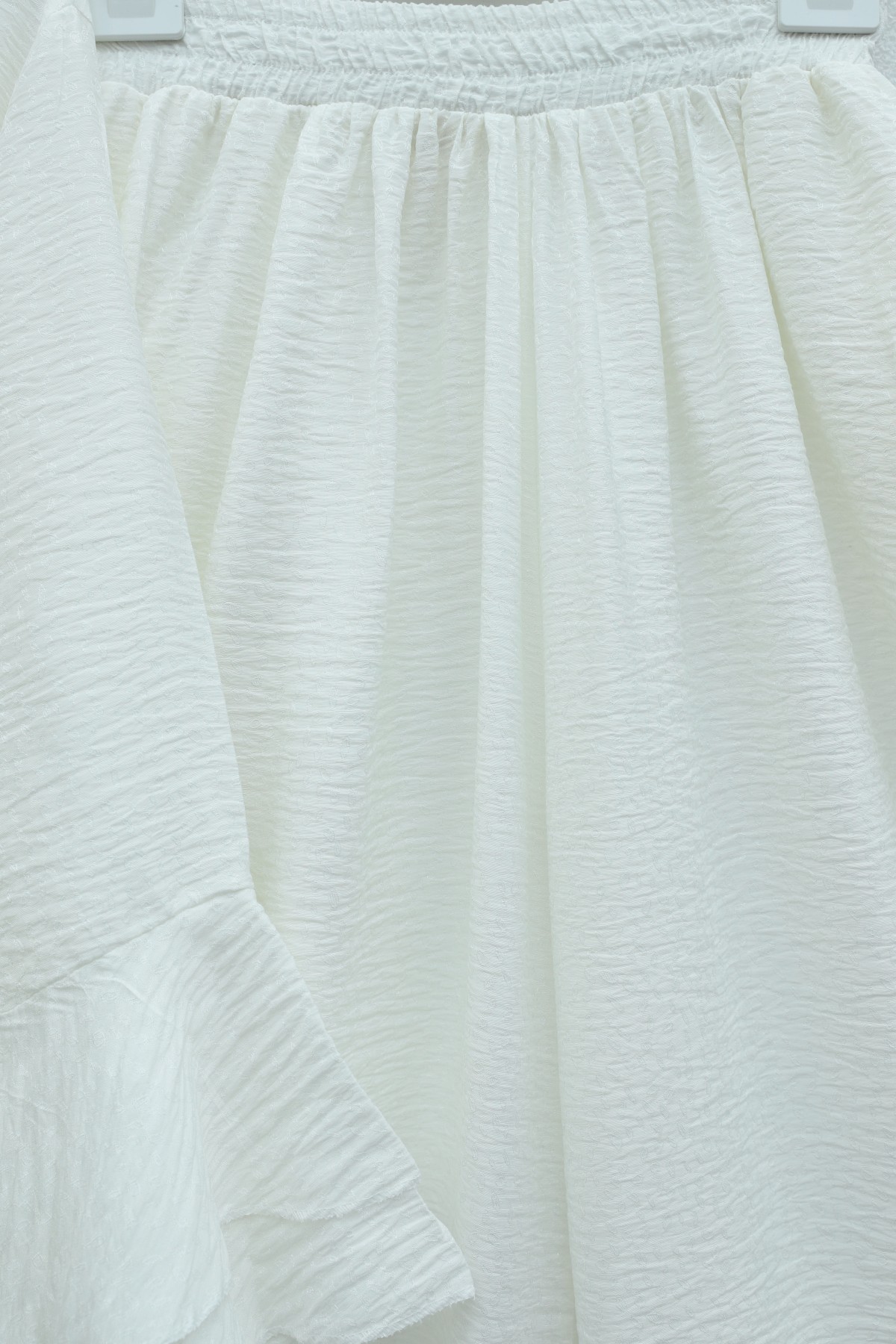 Jacquard Waffle Suit with Ruffled Cuffs and Wide Leg Trousers, and Belt. -White