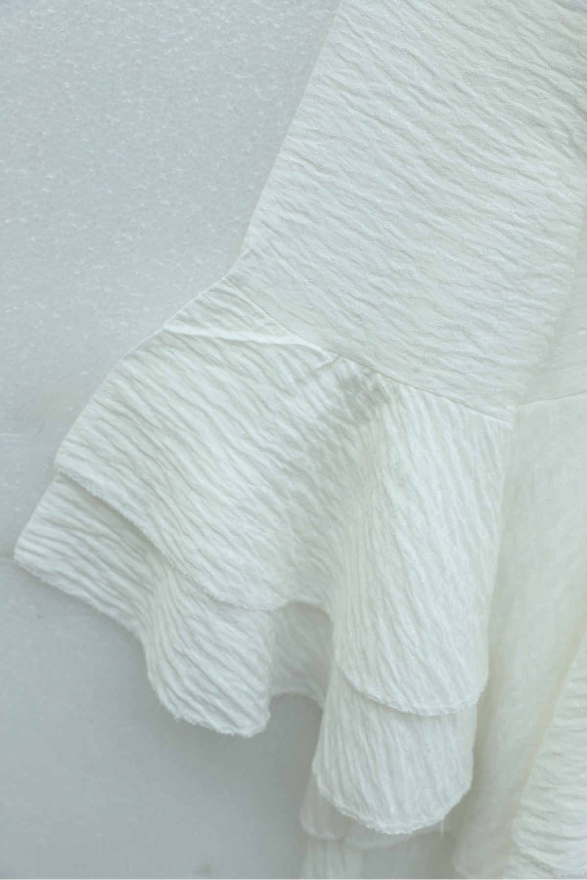 Jacquard Waffle Suit with Ruffled Cuffs and Wide Leg Trousers, and Belt. -White