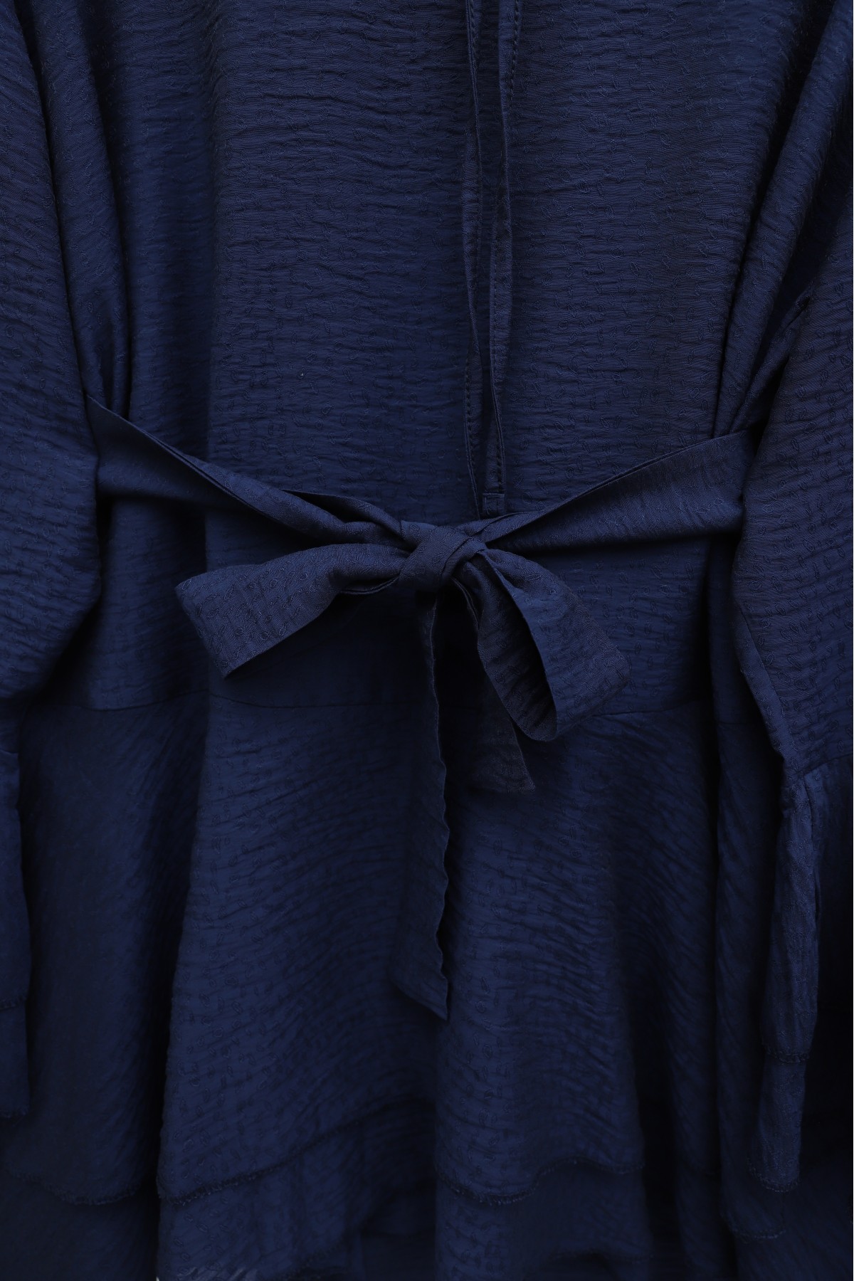 Jacquard Waffle Suit with Ruffled Cuffs and Wide Leg Trousers, and Belt. -Navy blue
