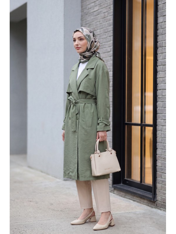 Trench coat made of polyester fabric with belt, pockets, and epauletted sleeves. -Khaki